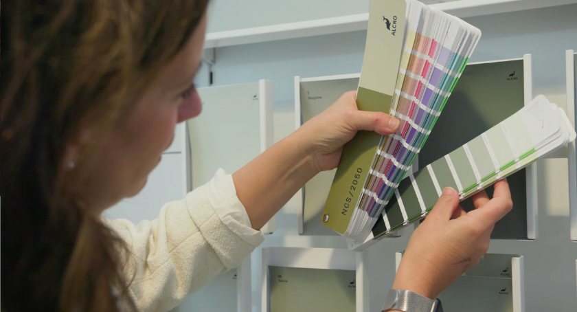 Women looking at colour cards